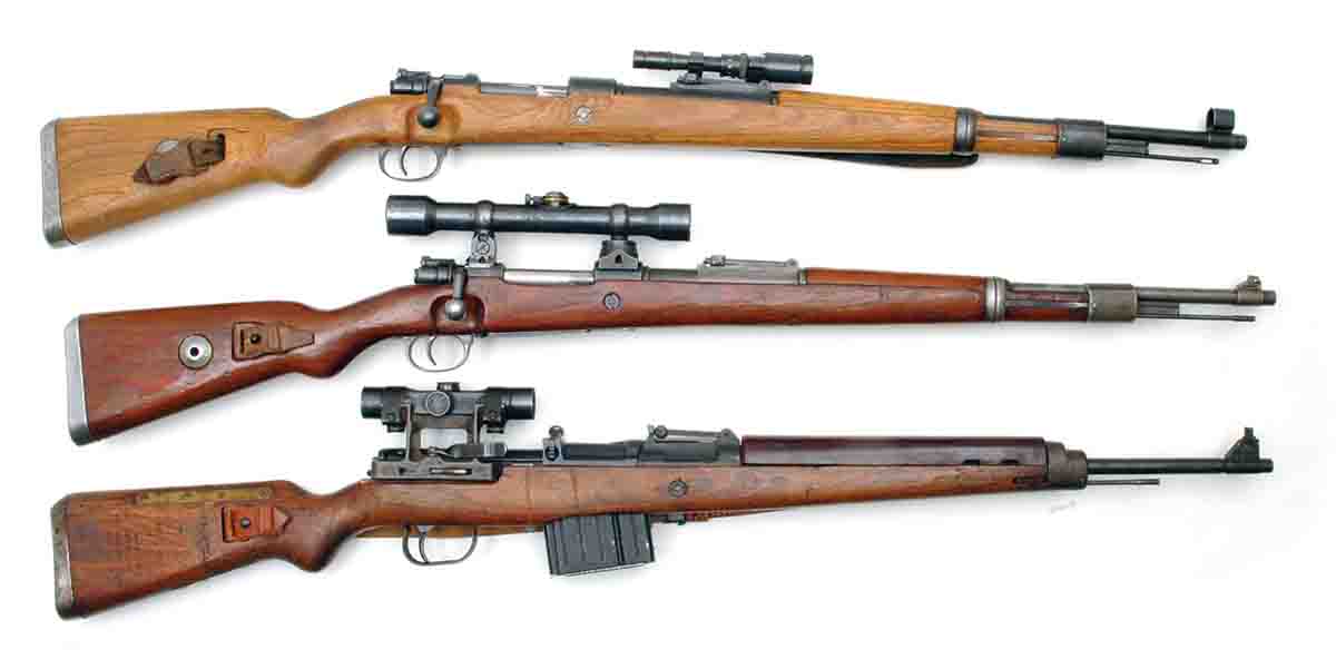 German ordnance officers intended for the G/K43 (bottom) to replace their bolt-action sniper rifles, but it failed in that application. Another failure was the K98k with its tiny ZF41 1.5x scope (top). In between is a K98k with a standard 4x Zeiss scope in low turret mounts.